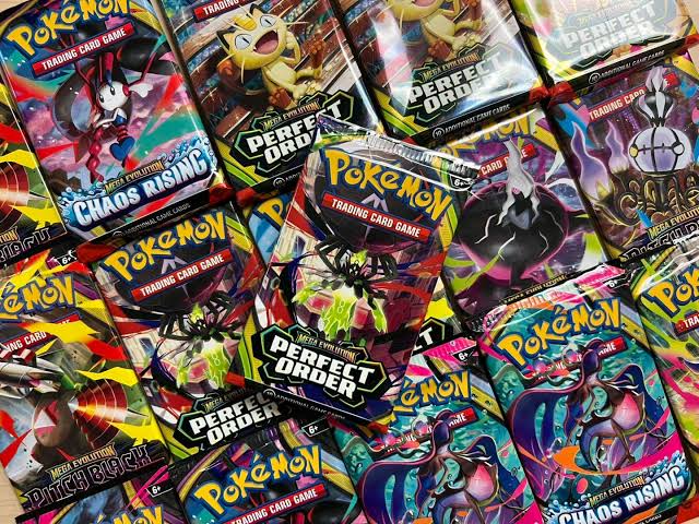 Sealed booster packs spread out, ready to pull from a Drop Culture machine